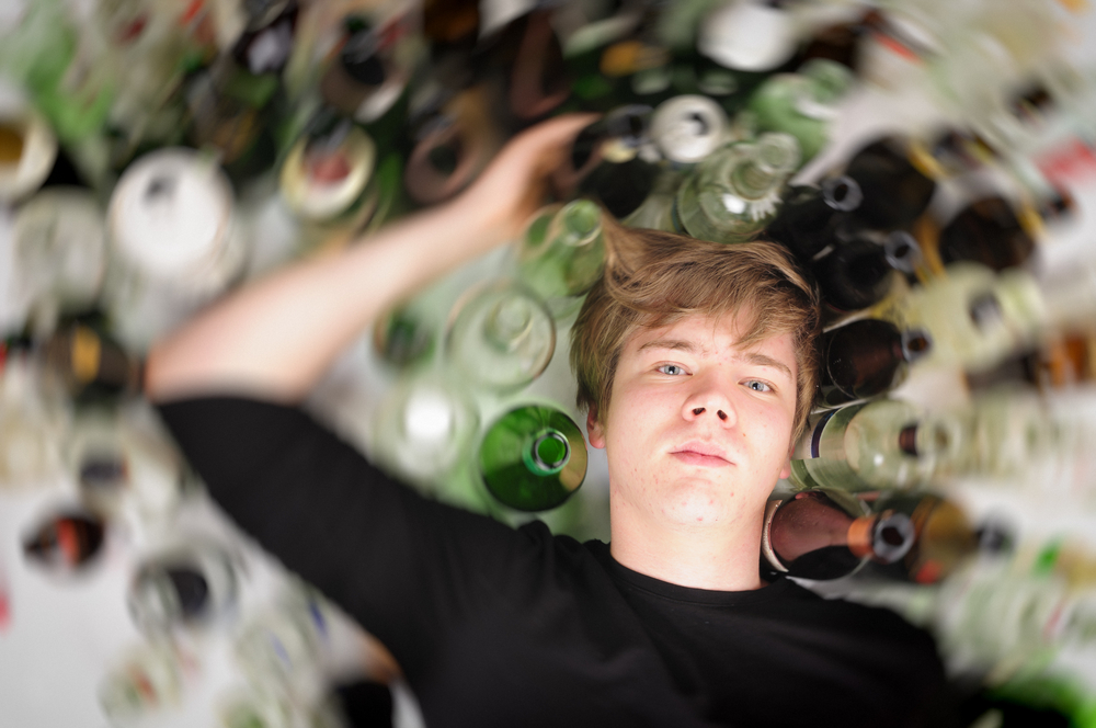 Alcohol brand use of youth-appealing advertising and consumption by youth and adults