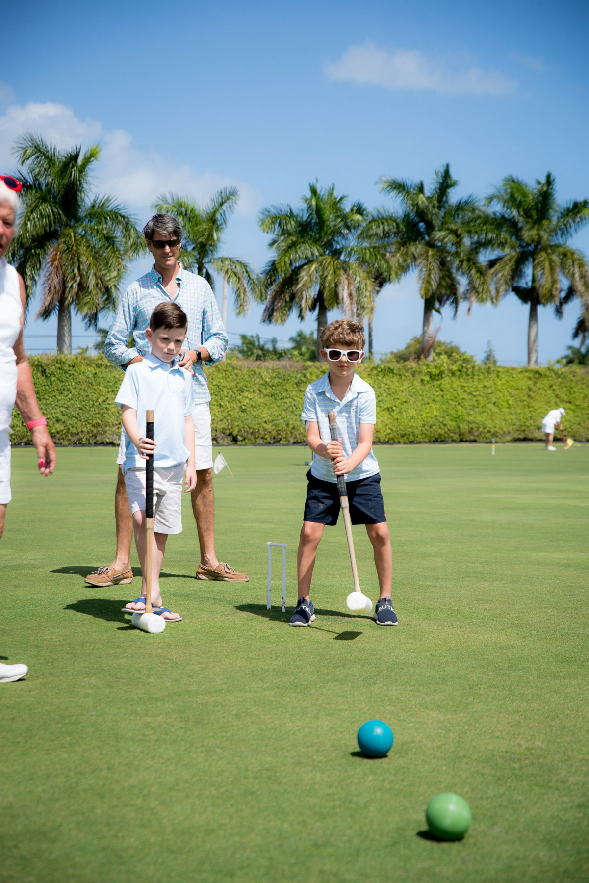 Children playing croquet