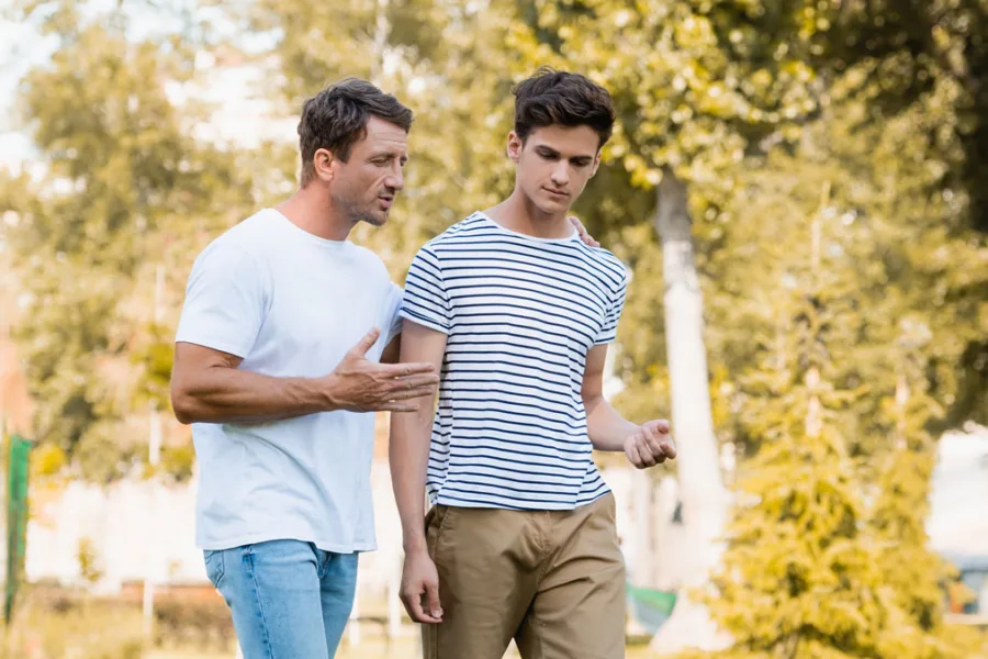 Father and son talking