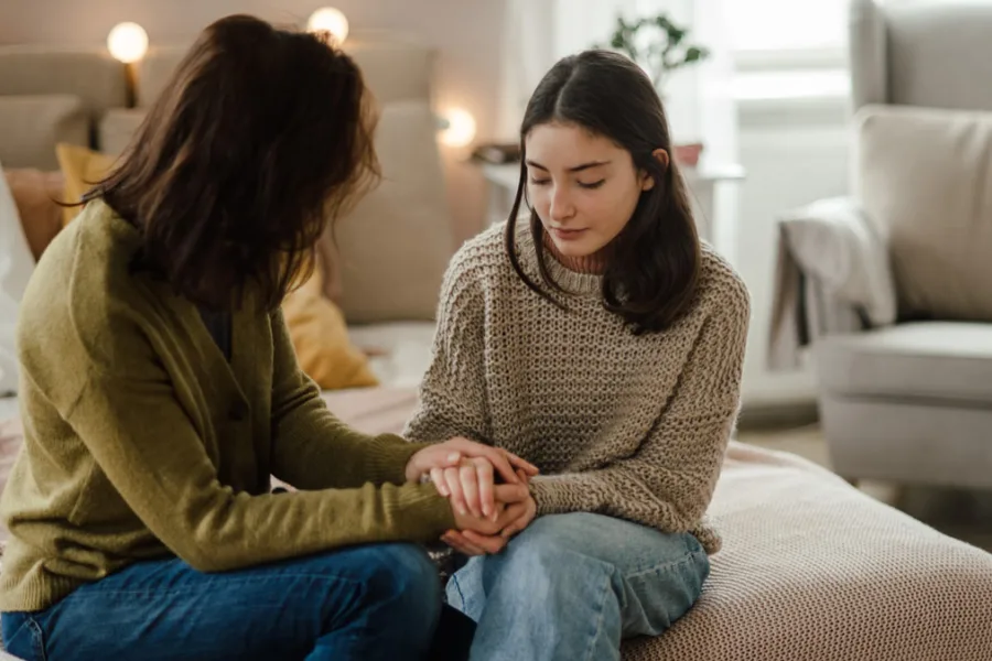 Mother and teen talking