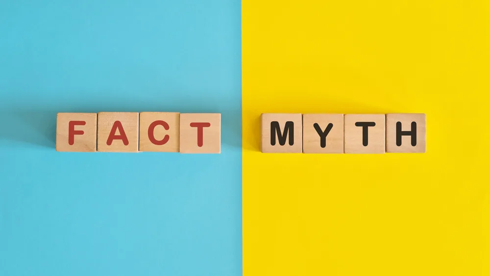 letter tiles spelling out fact and myth